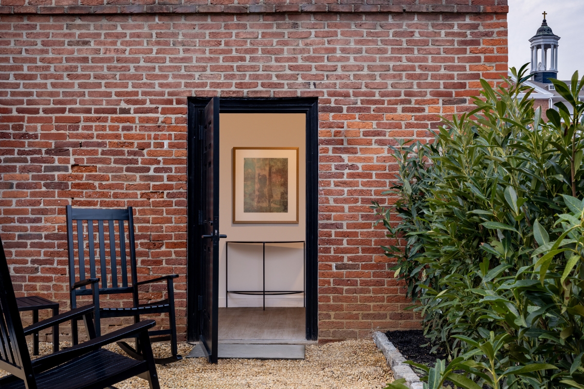 a door to a brick building