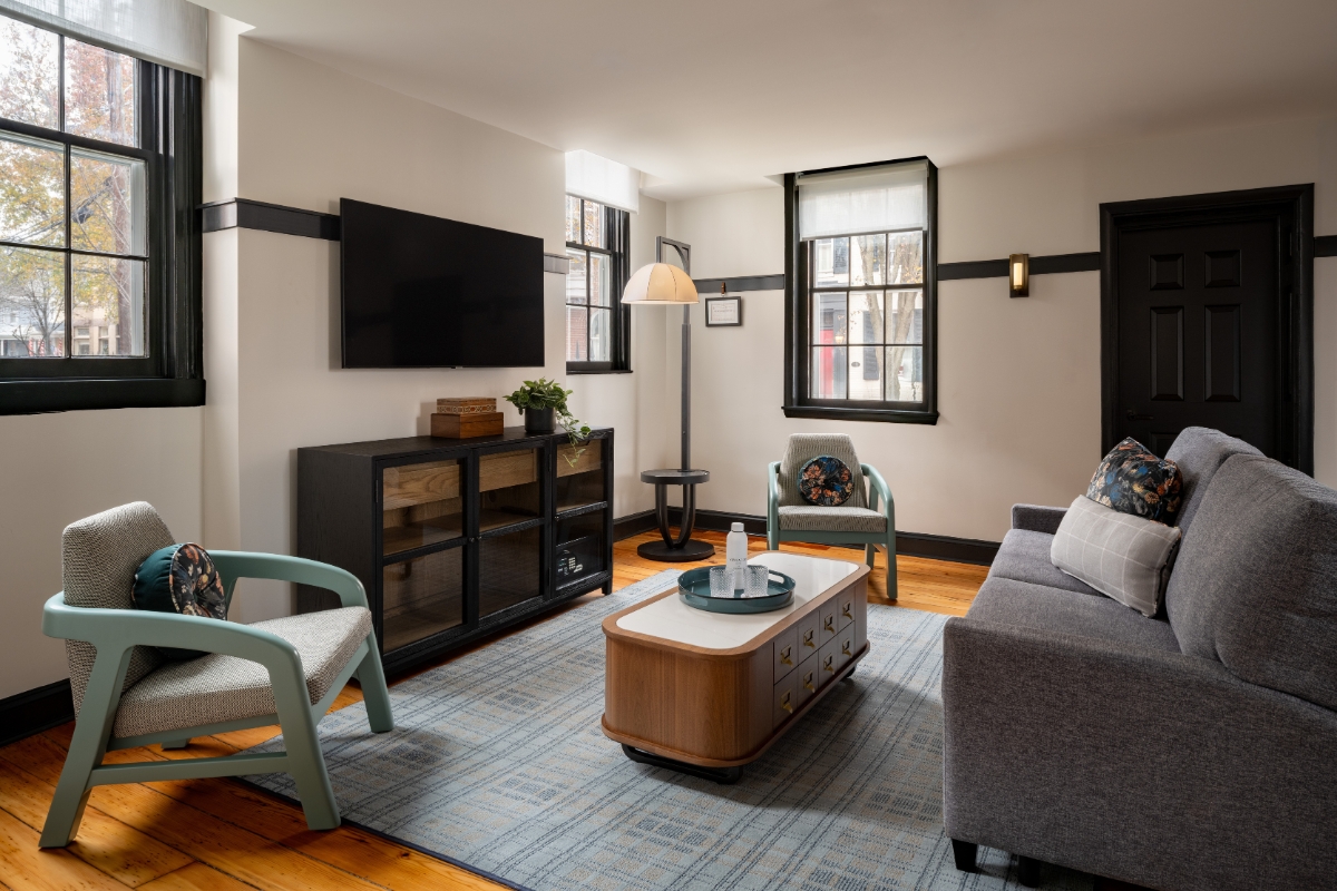 a living room with a tv and a couch