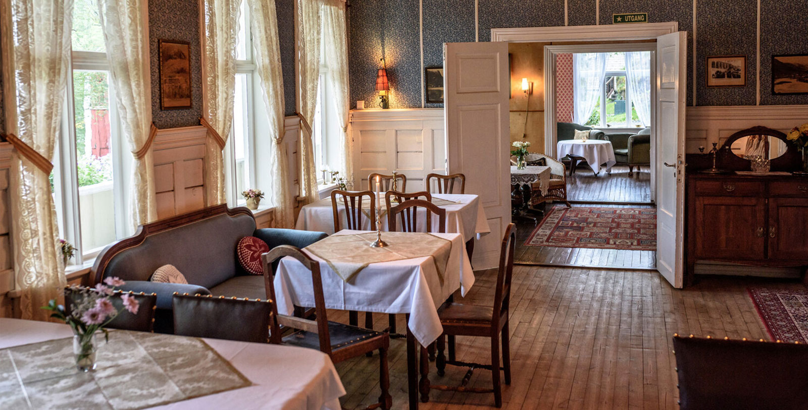 a room with tables and chairs