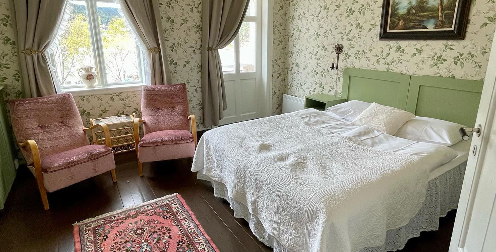 a bedroom with a bed and a chair