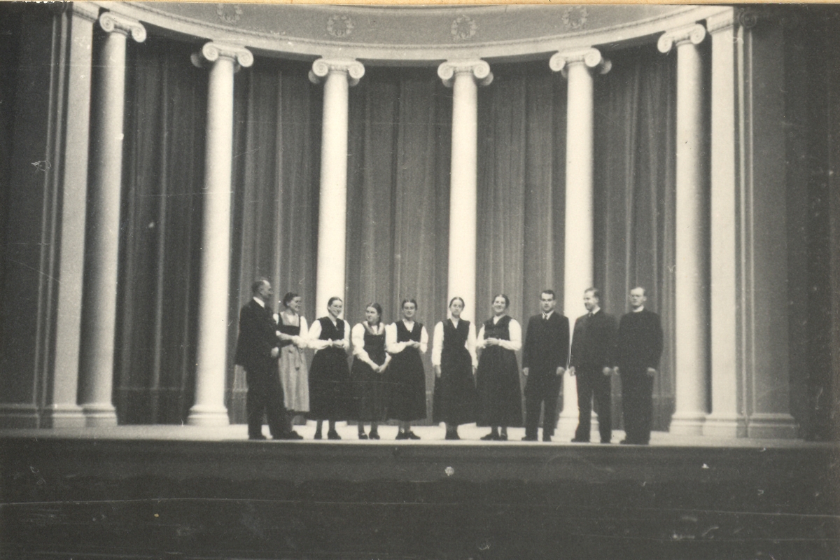 a group of people on a stage