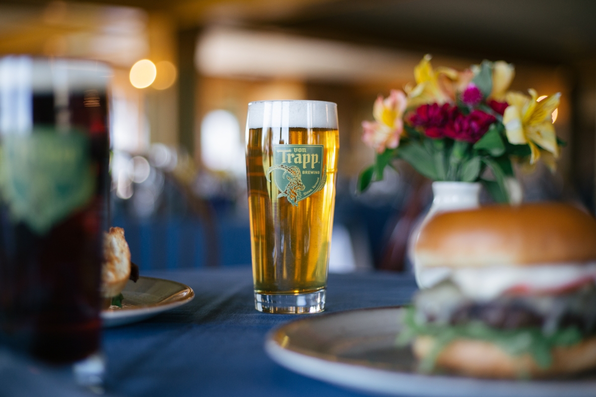 a glass of beer on a table