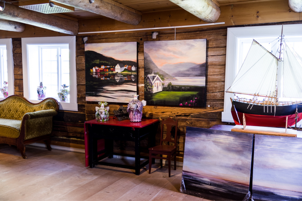 a room with paintings on the wall
