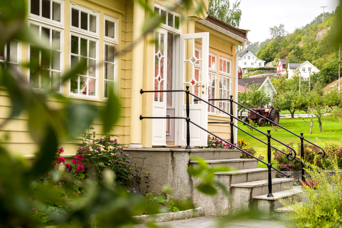 a house with stairs and railings