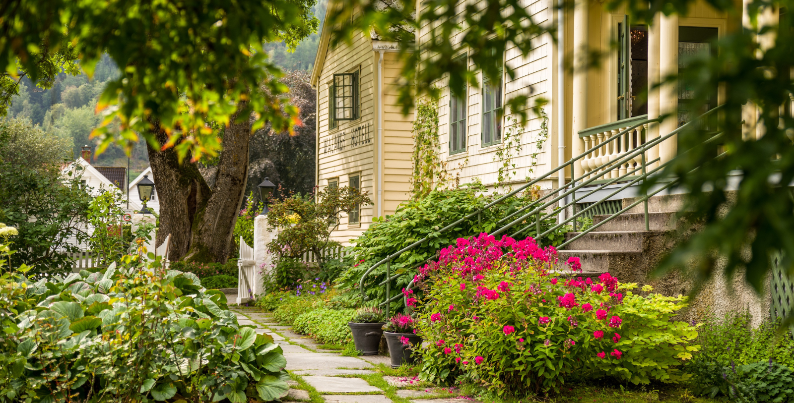 a house with a garden and stairs