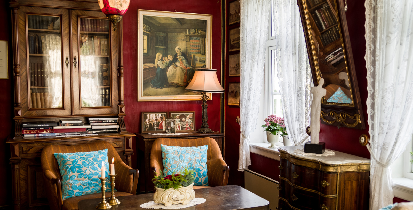 a room with a painting on the wall