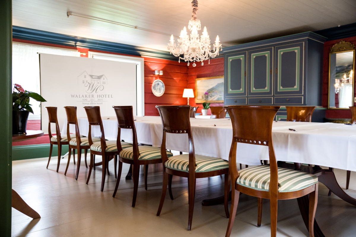 a room with a table and chairs