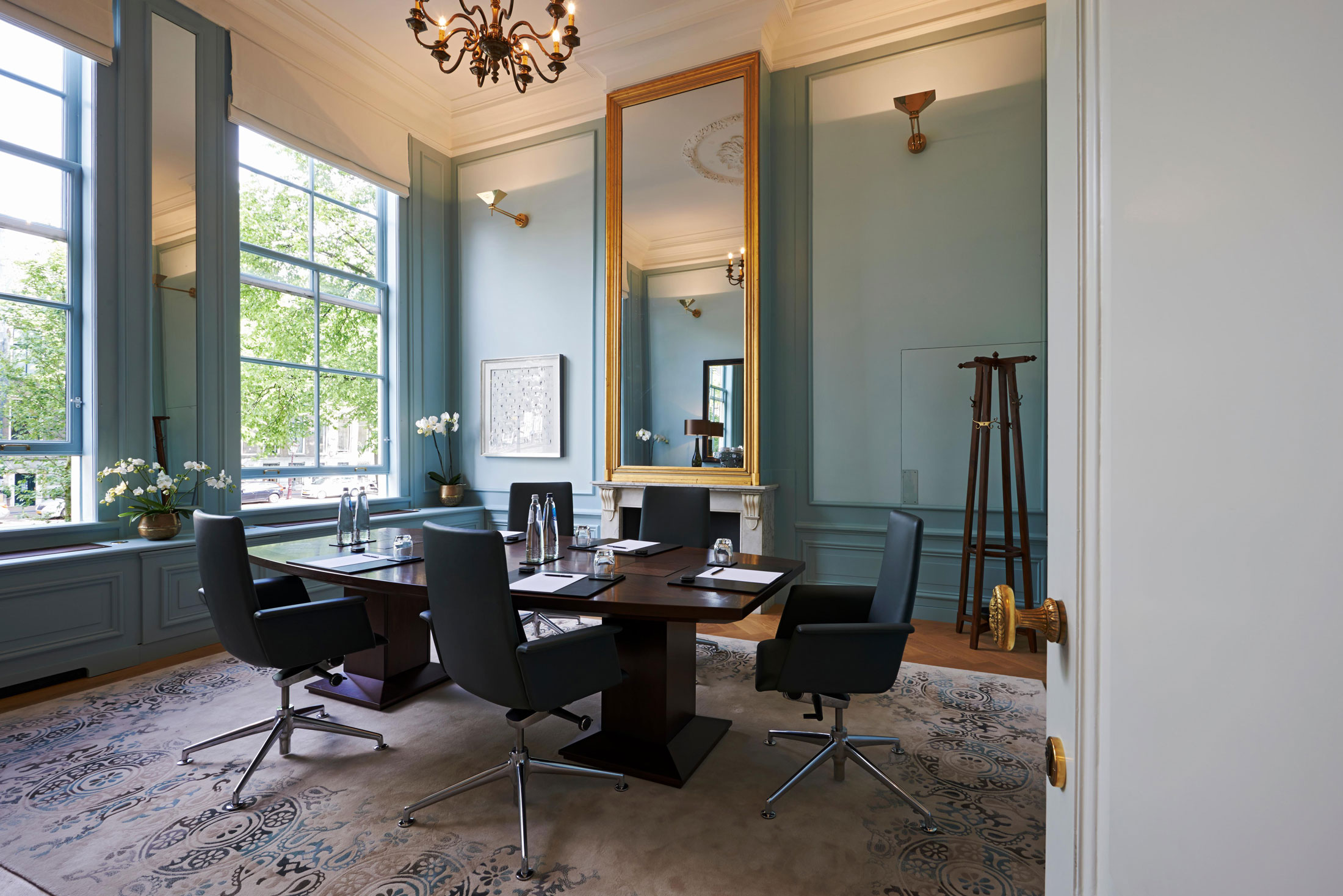 a room with a table and chairs