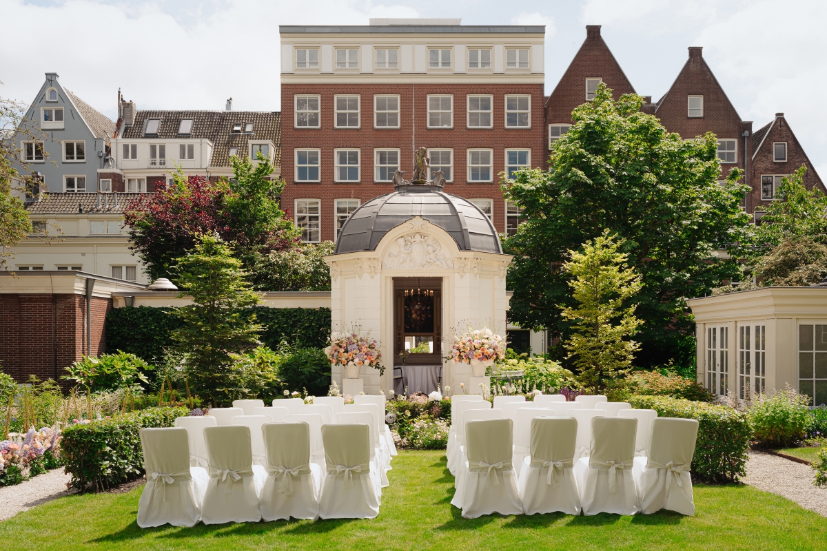 a group of chairs in a garden