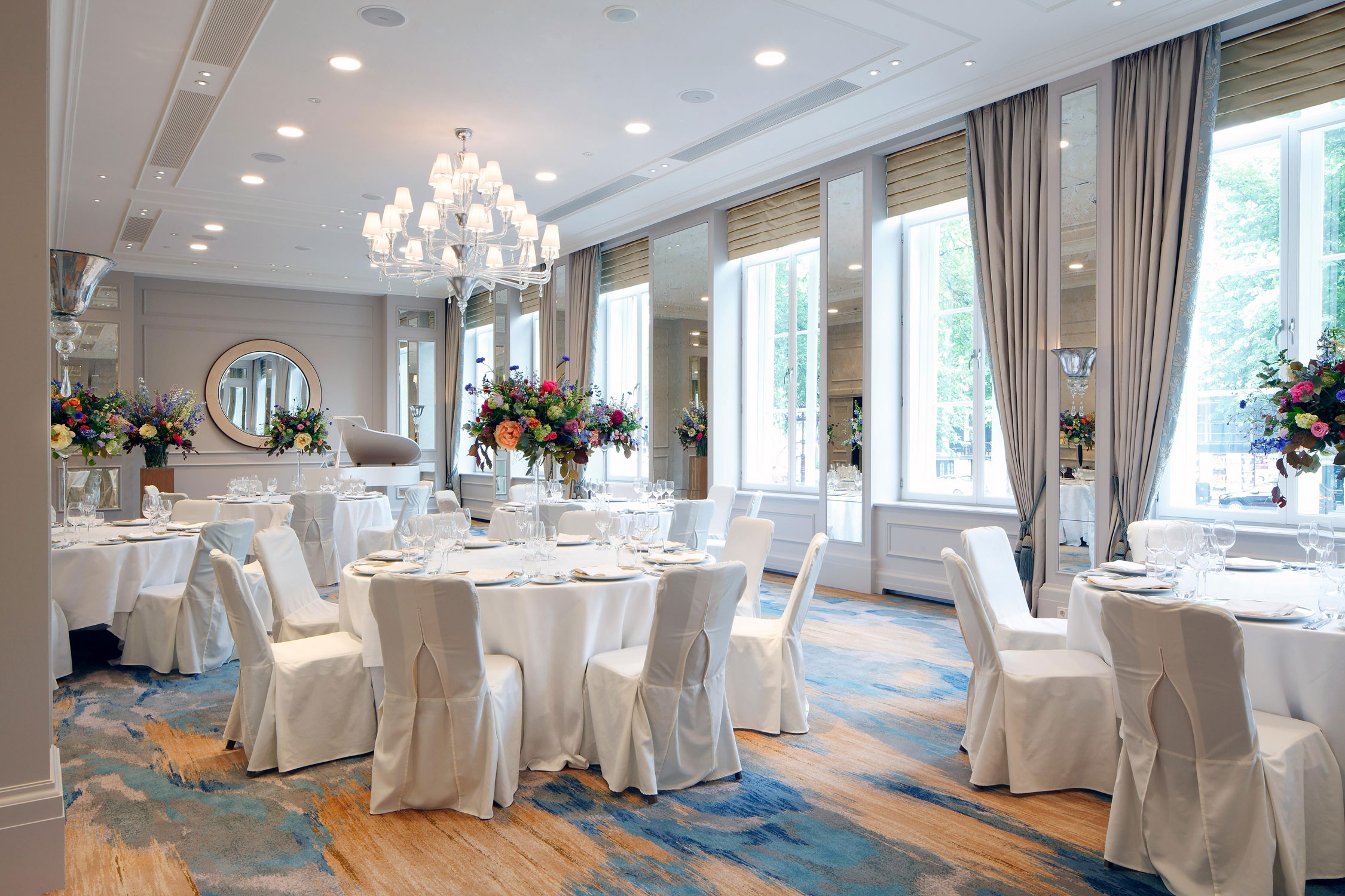 a room with tables and chairs