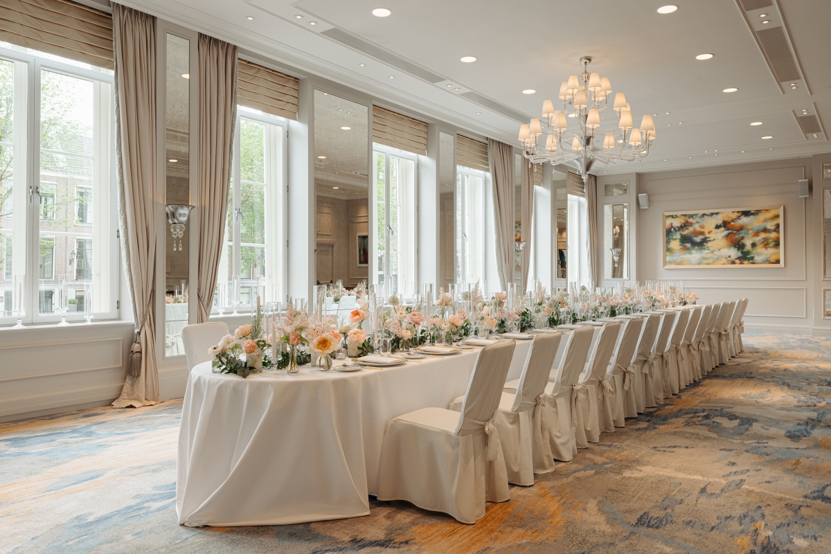 a long table set for a wedding