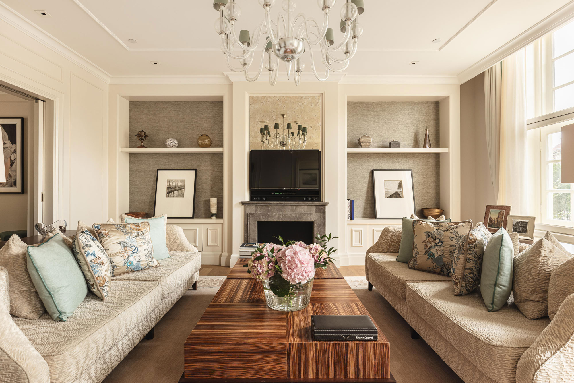a living room with a fireplace and couches