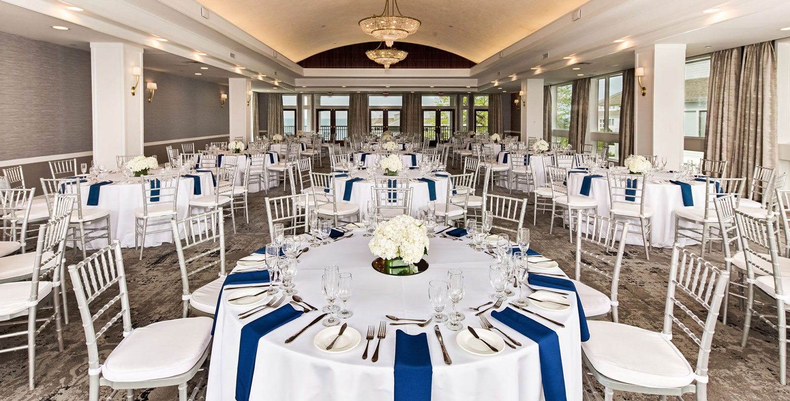 a room with tables and chairs