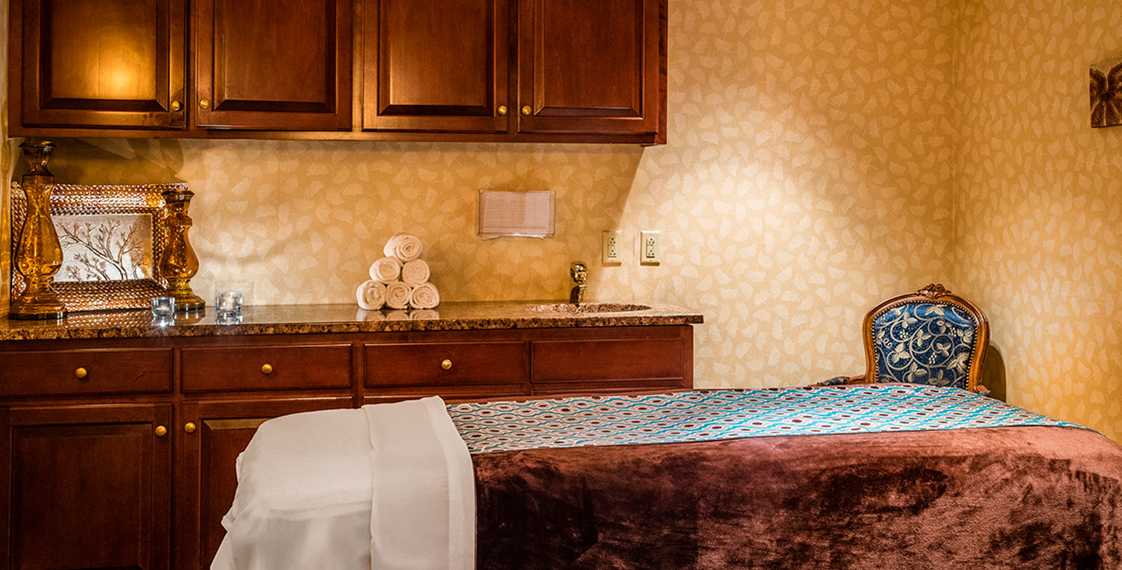 a hotel room with a bed and towels