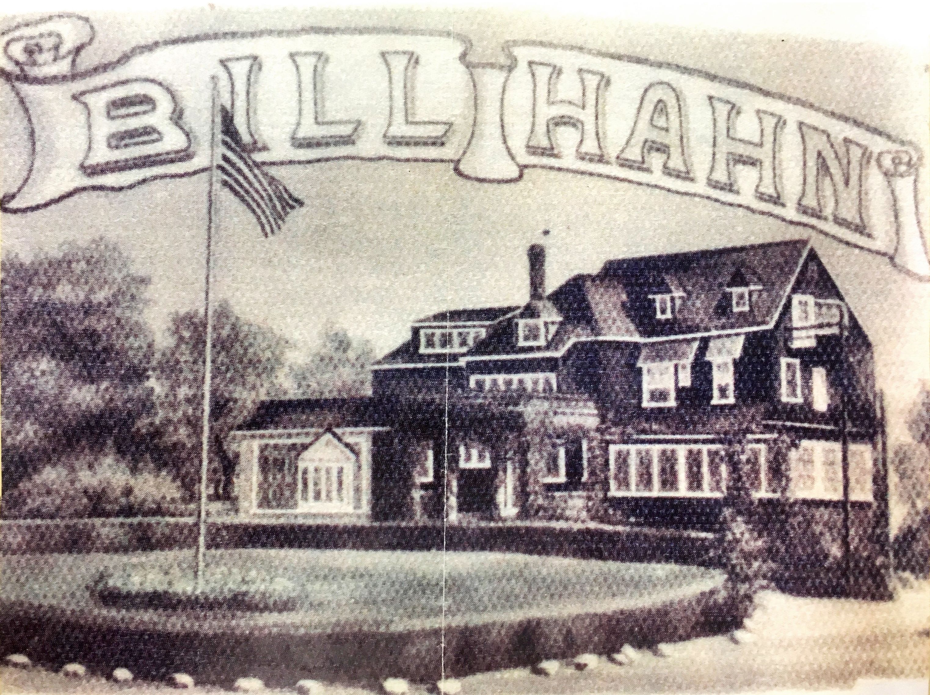 a large house with a flag