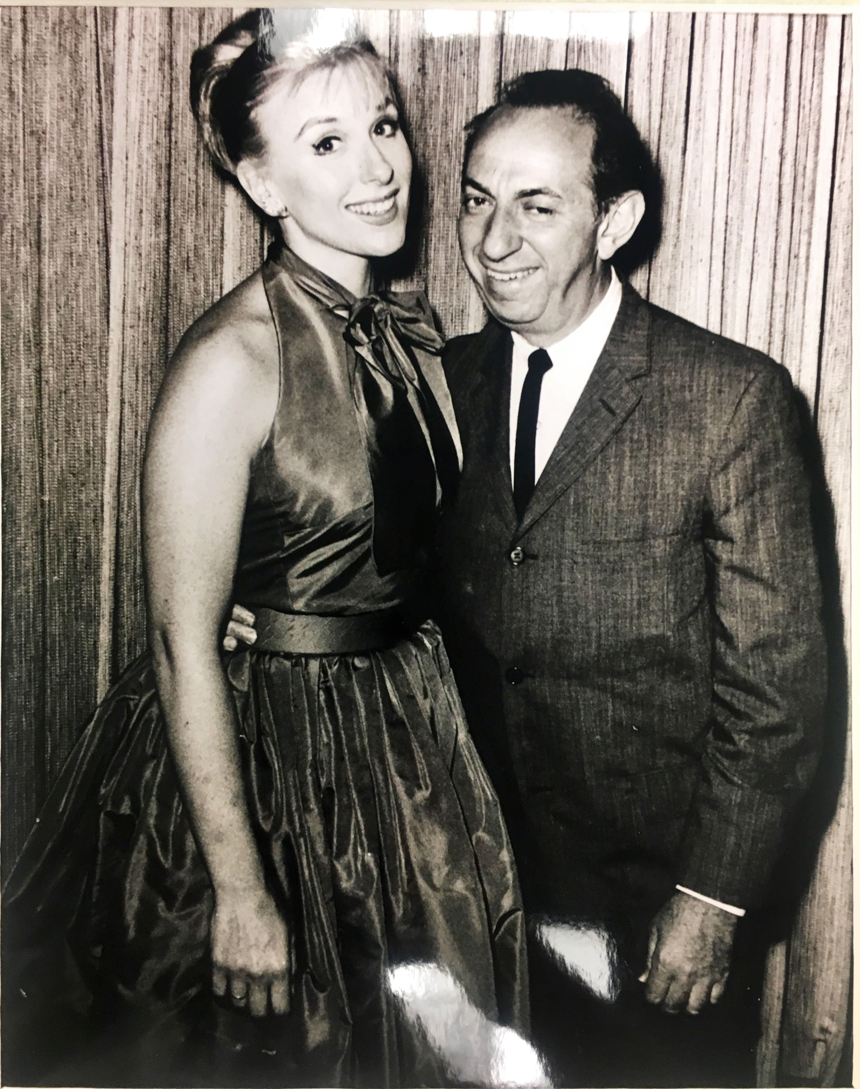 a man and woman posing for a picture