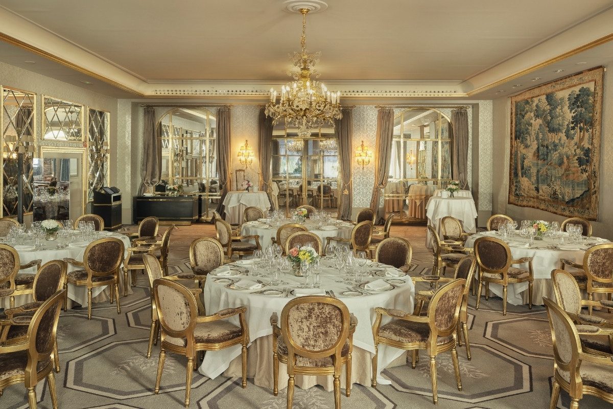 a room with tables and chairs