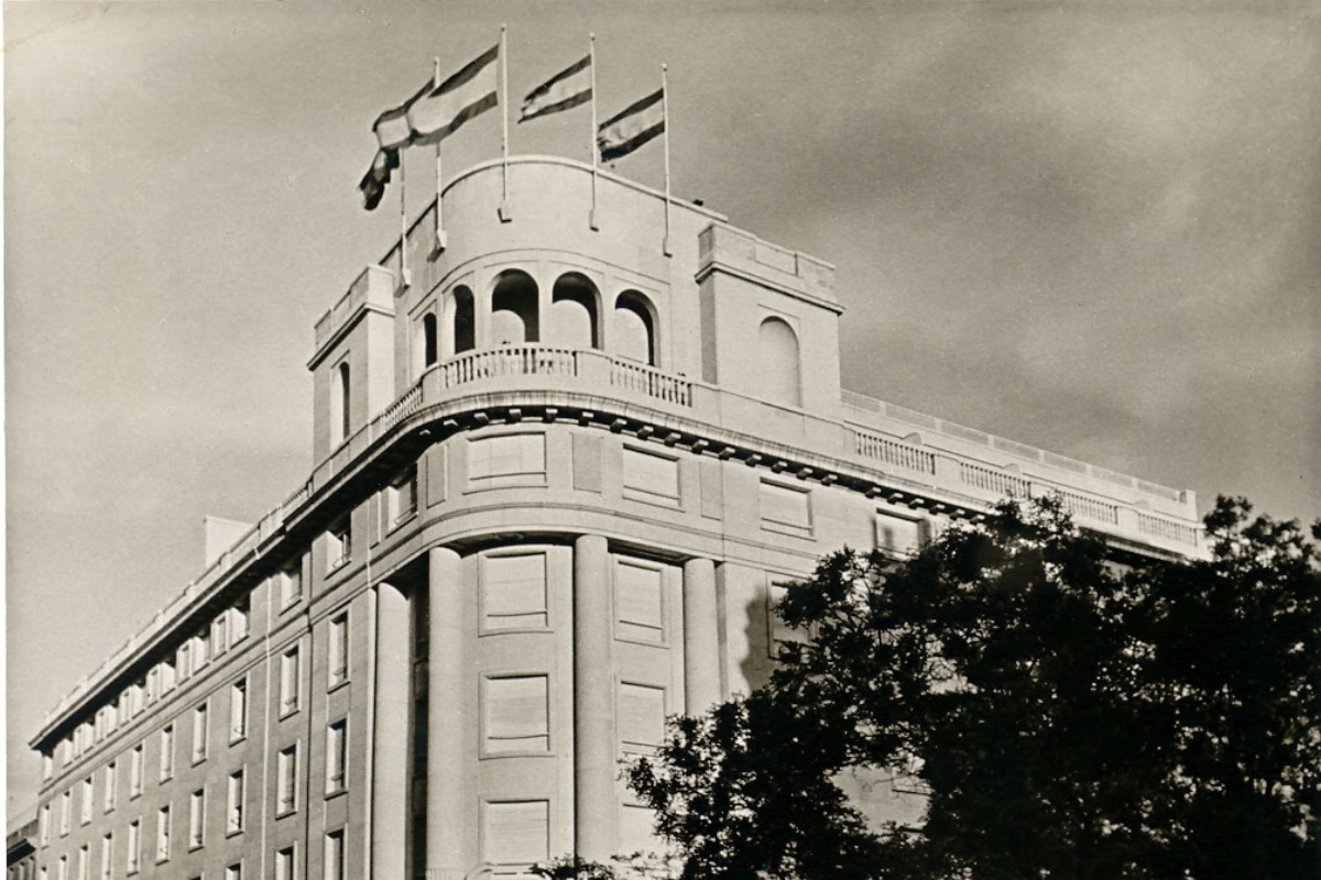 a building with flags on top