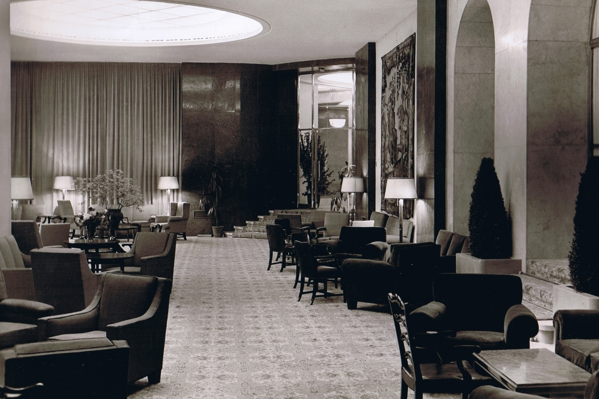 a room with chairs and tables