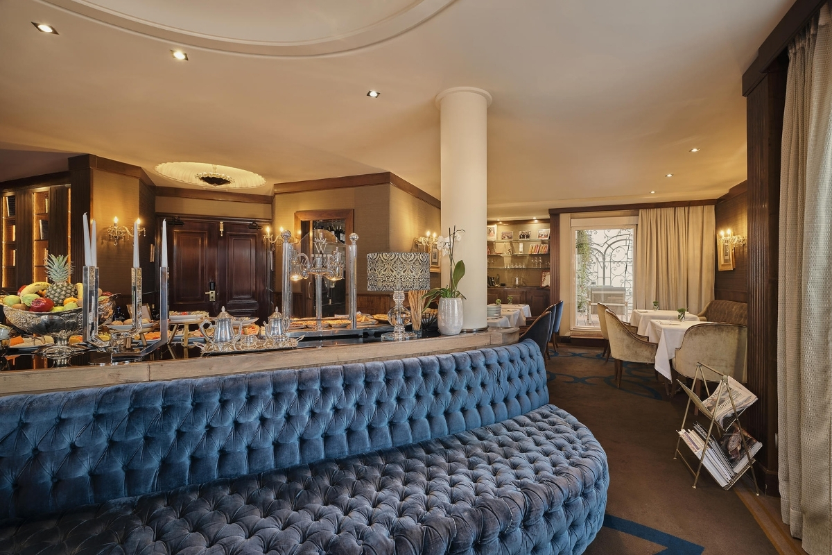 a restaurant with a blue couch