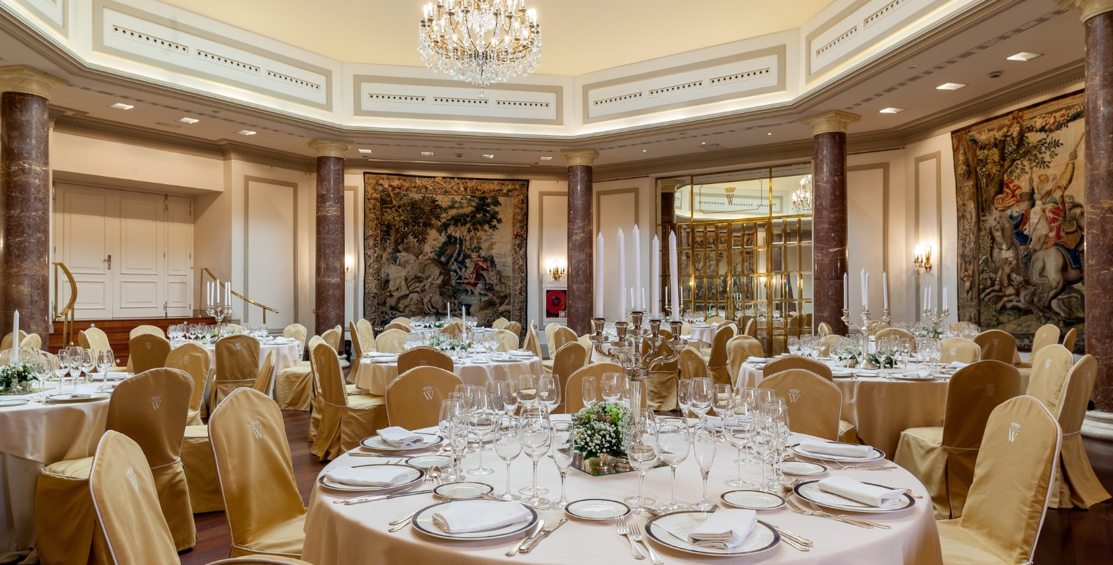 a room with tables and chairs
