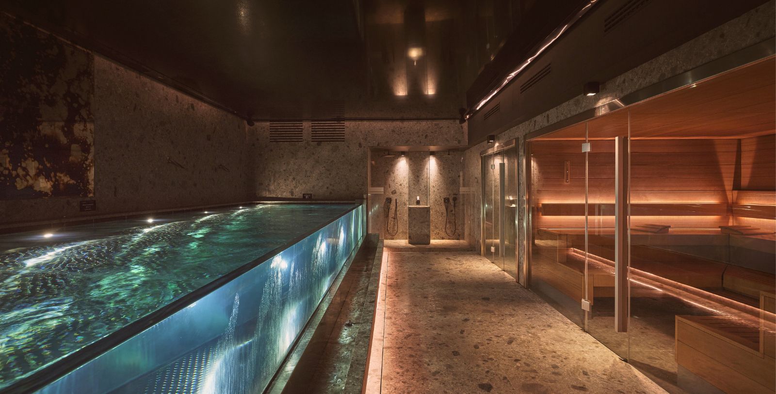 a indoor pool with water in a room