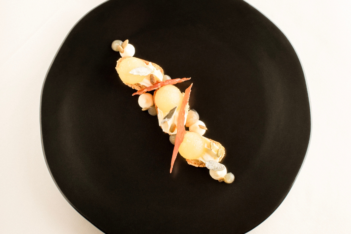 a plate of food on a white surface