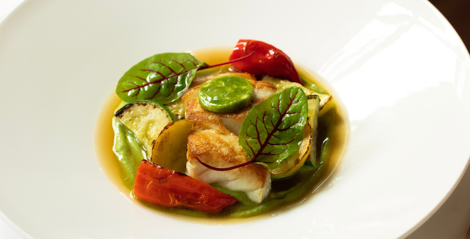 a plate of food with vegetables