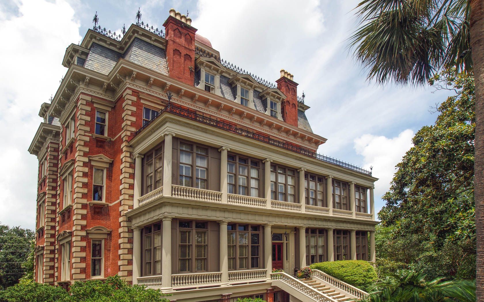 a large brick building with a staircase