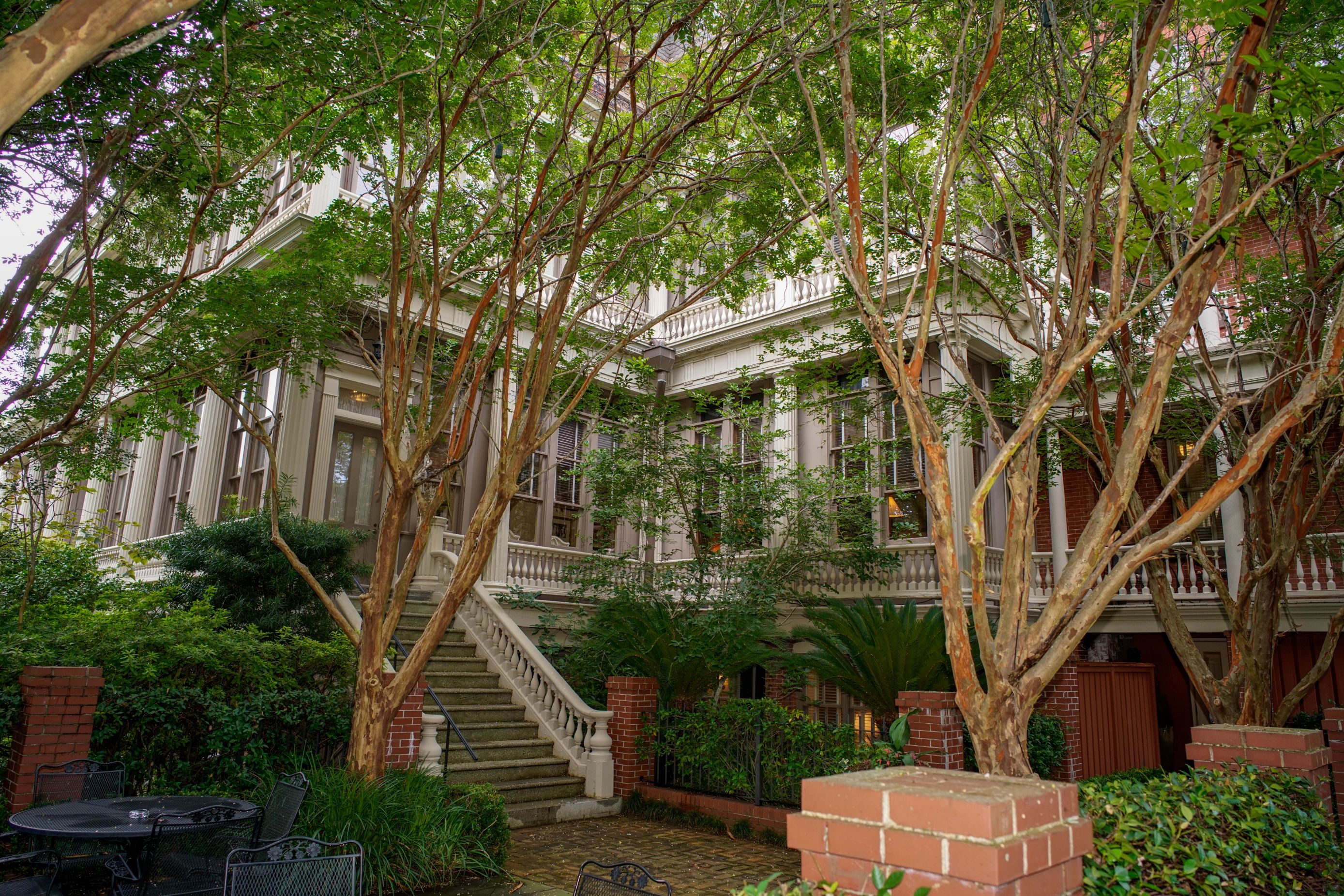 a building with trees and stairs