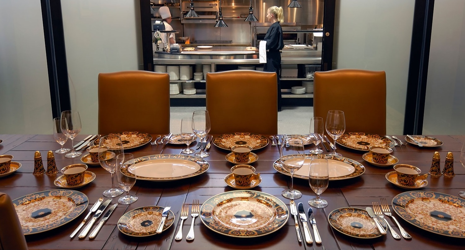 a table with plates and glasses