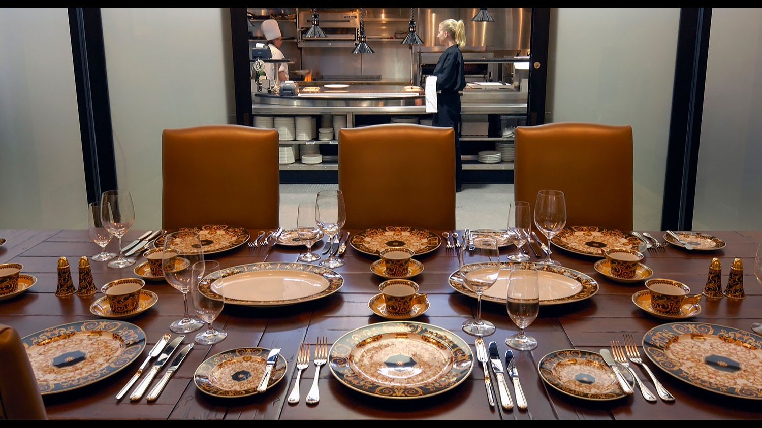 a table with plates and glasses