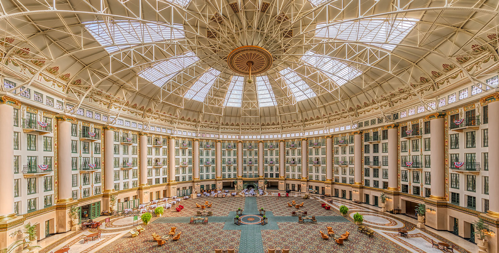 a large circular building with many windows and a large ceiling