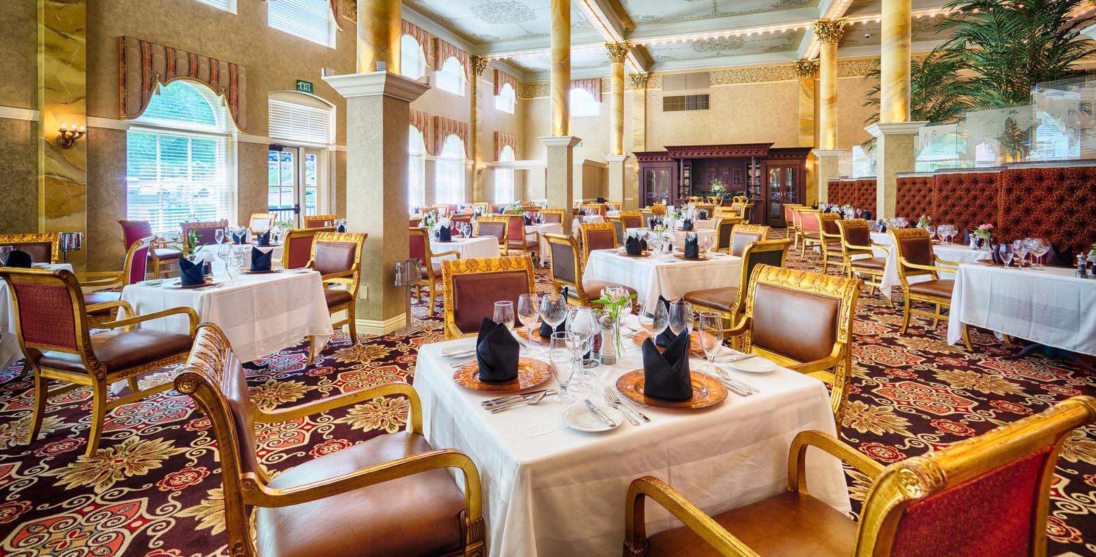 a restaurant with tables and chairs