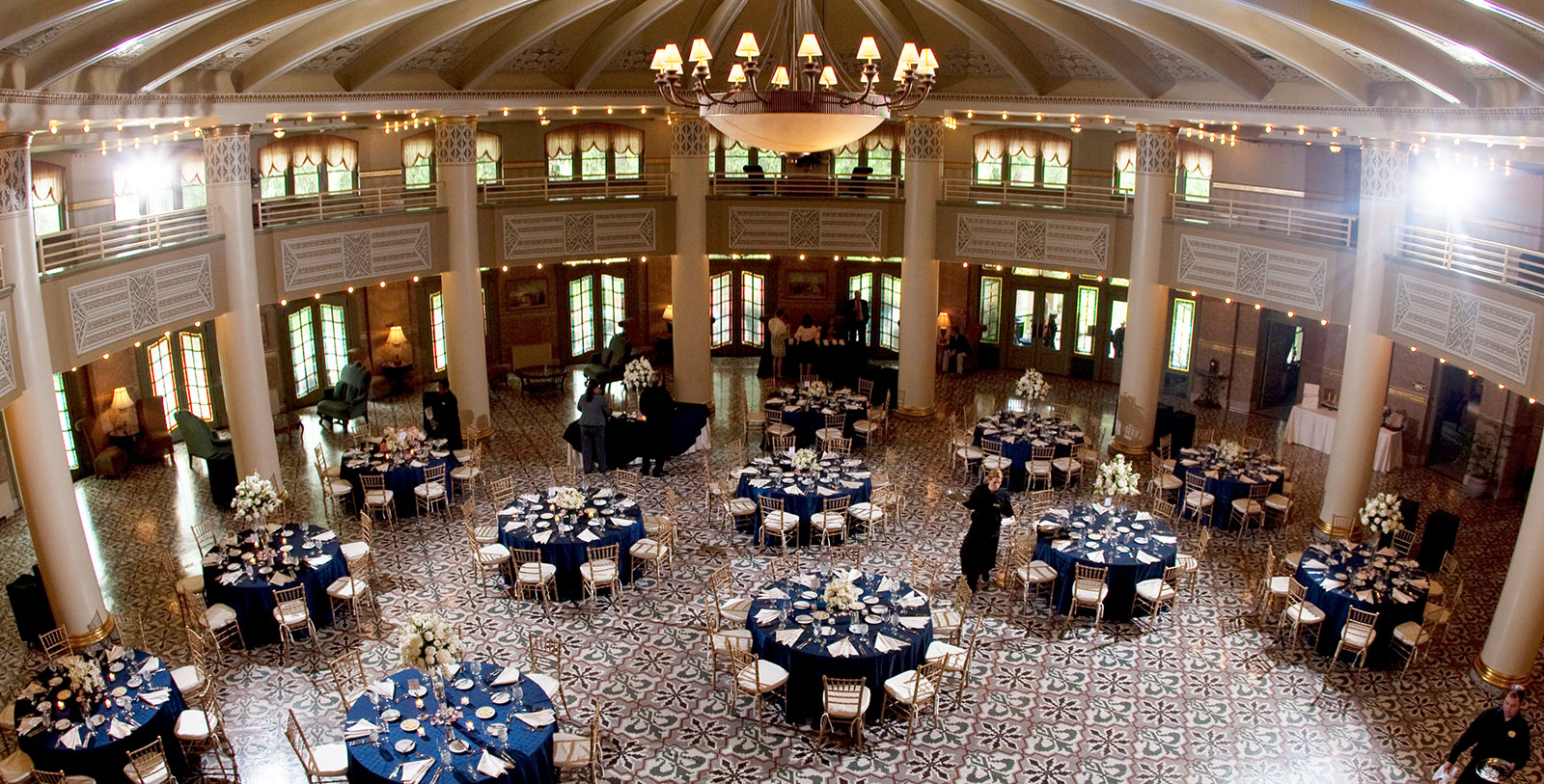 a large room with tables and chairs