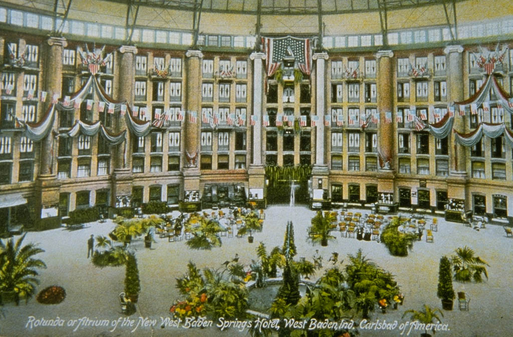 a large round building with many windows and a round floor