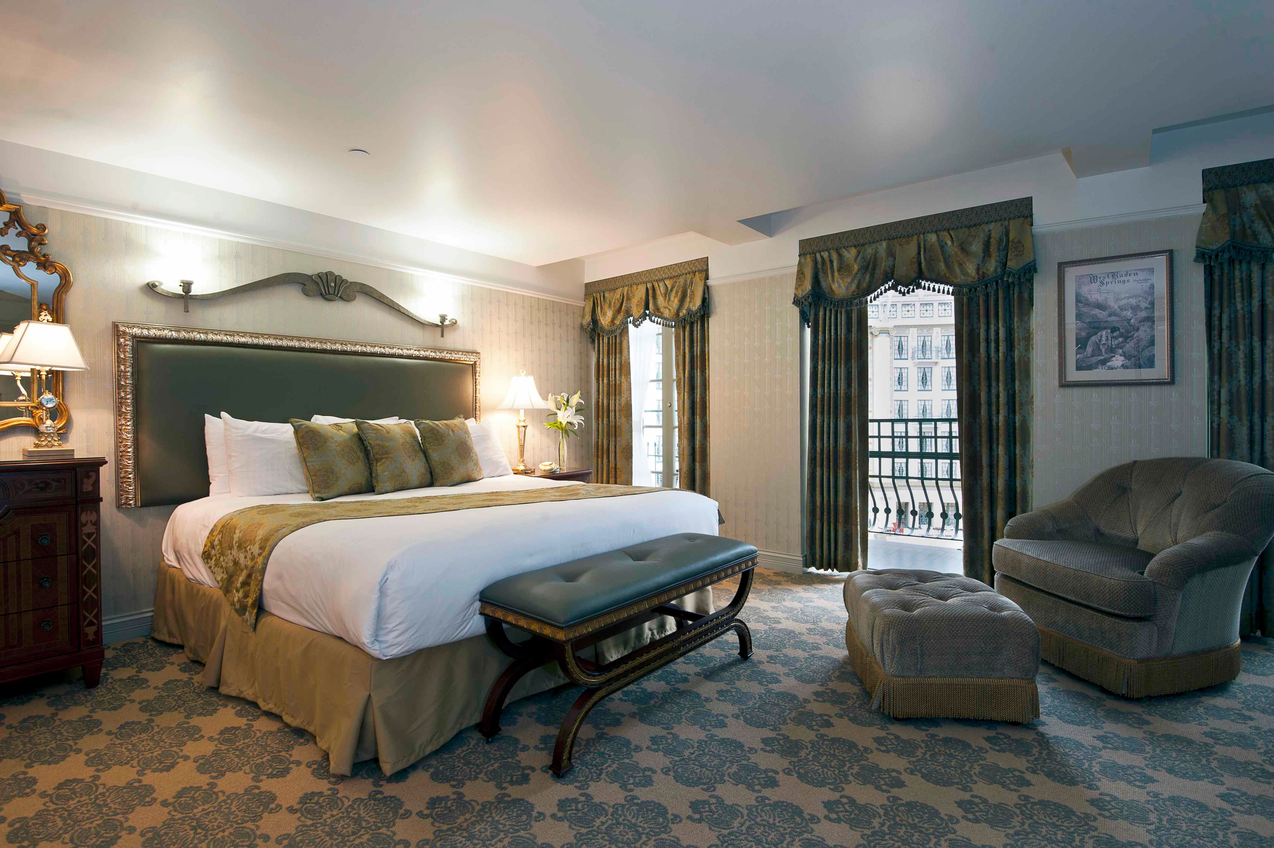 a bedroom with a bed and a chair