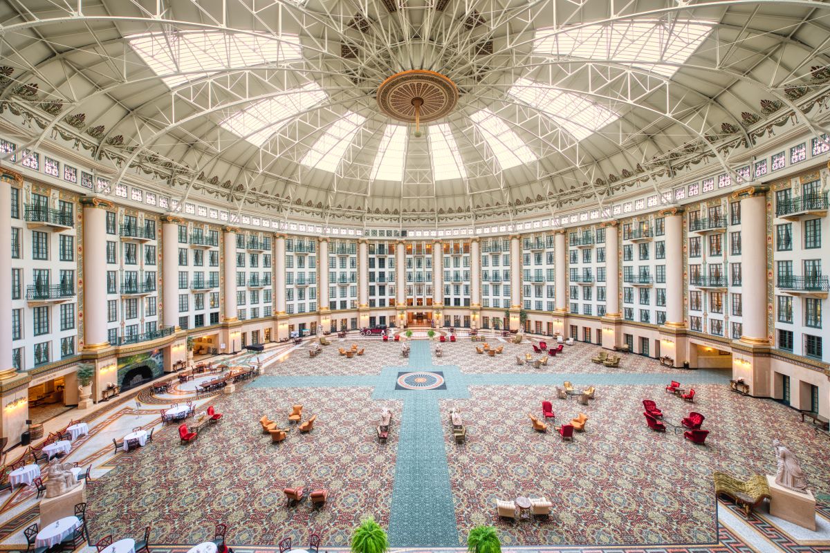 a large circular building with many windows and a large ceiling