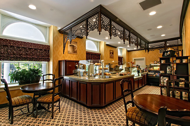 a restaurant with a counter and a table