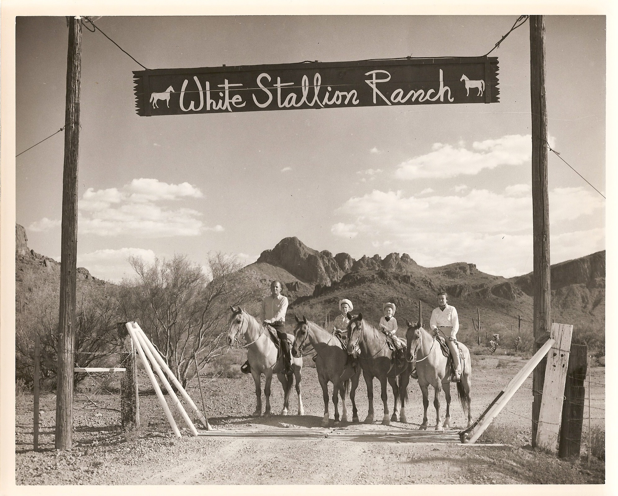 a group of people on horses