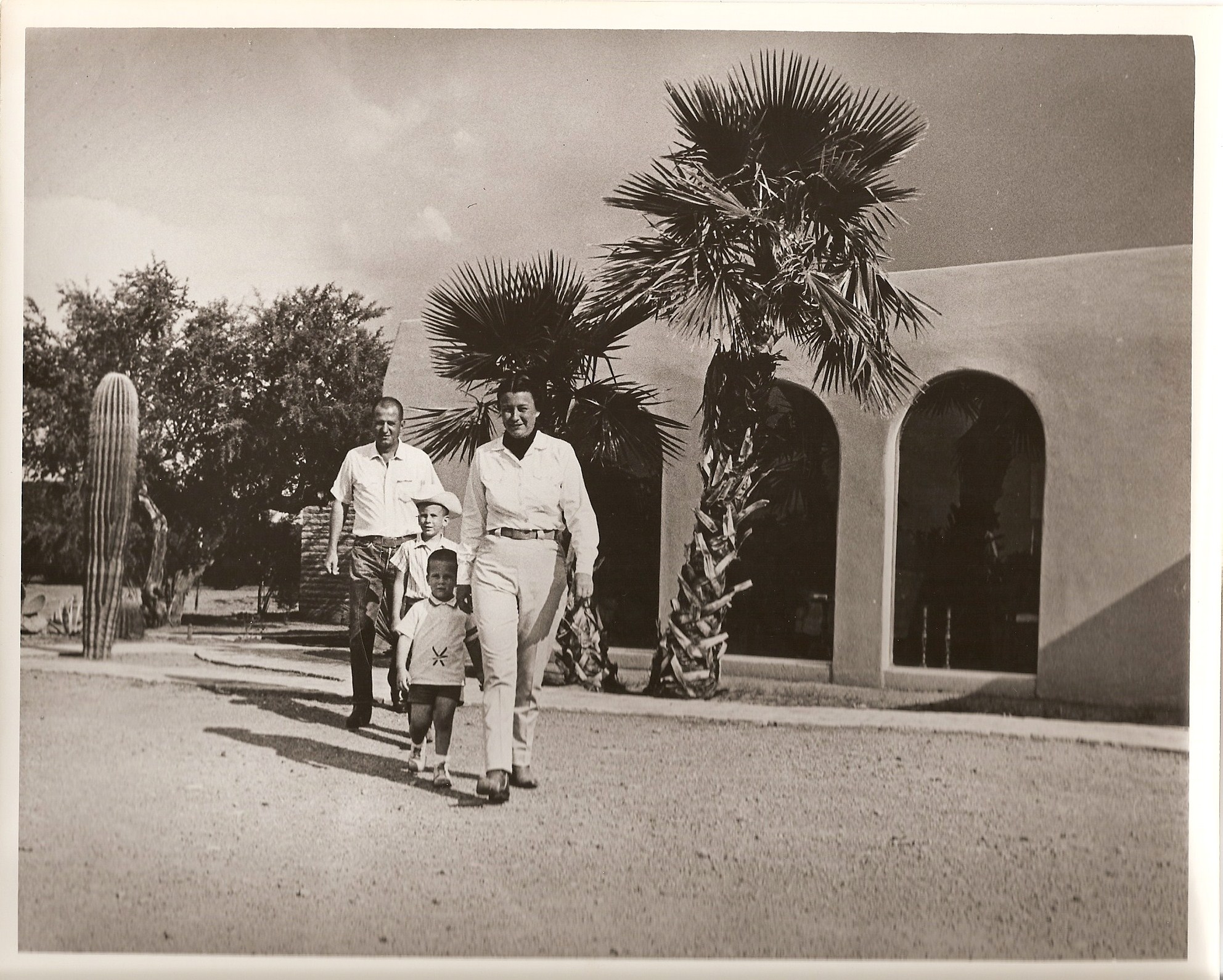 a group of people walking on a road