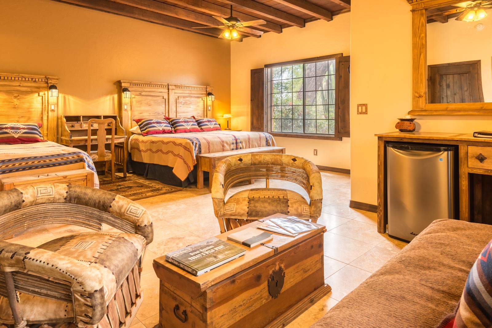 a room with a bed and a television