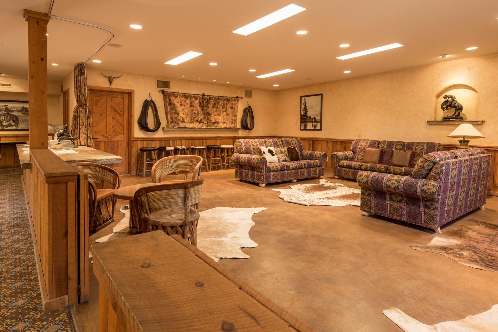 a room with couches and chairs