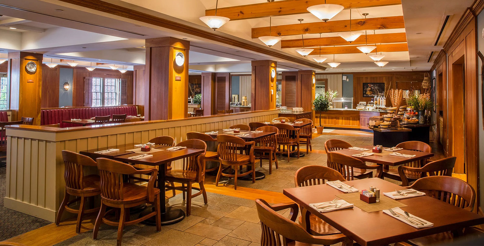 a restaurant with tables and chairs
