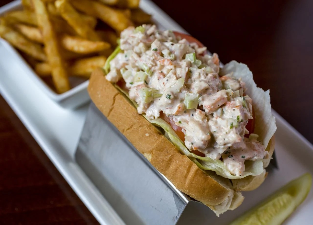 a sandwich with a side of french fries