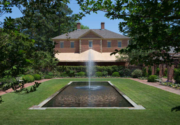 a water fountain in a garden