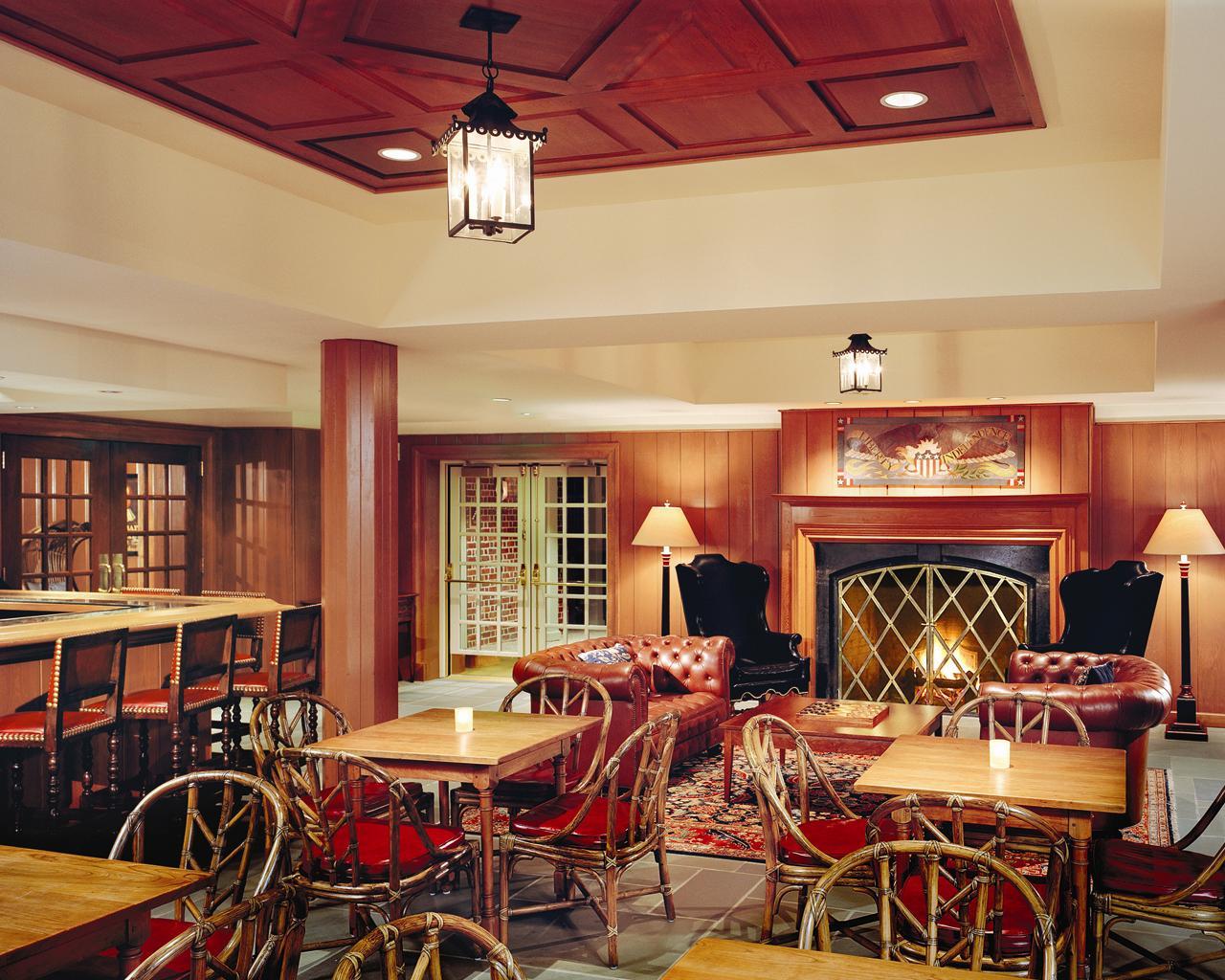 a room with tables and chairs
