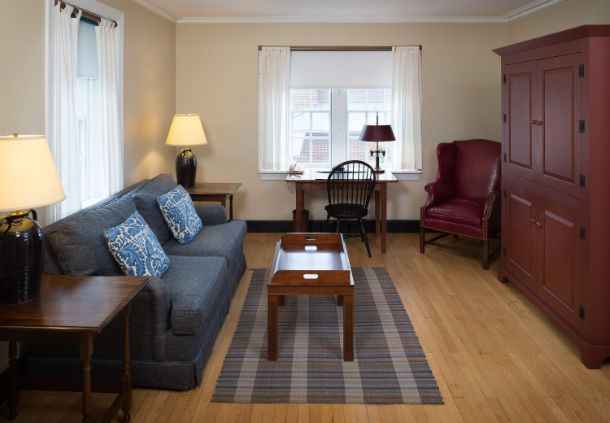 a living room with a couch and a table