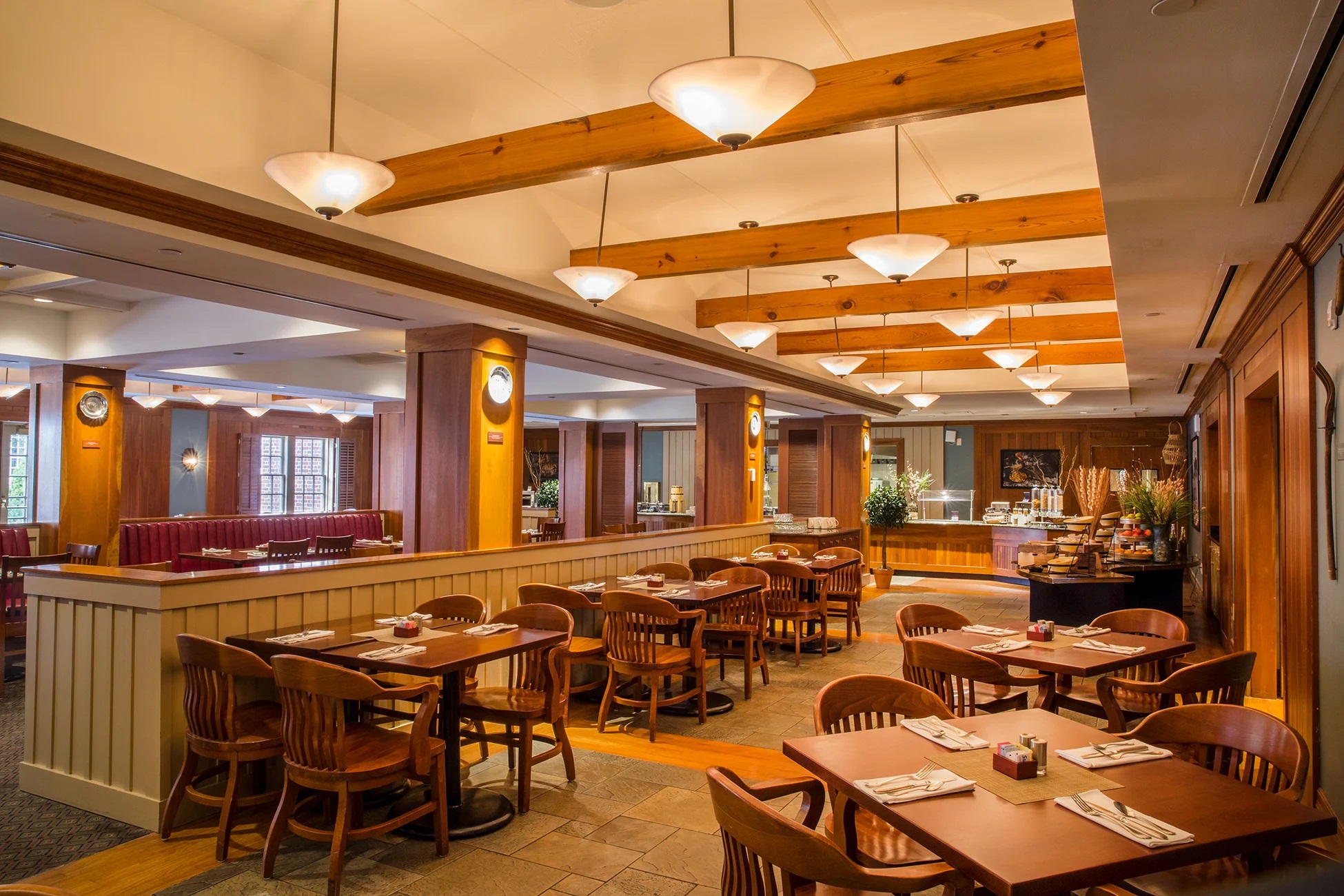 a restaurant with tables and chairs
