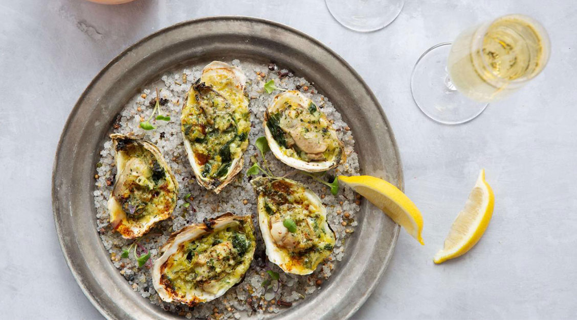 a plate of food with a lemon wedge